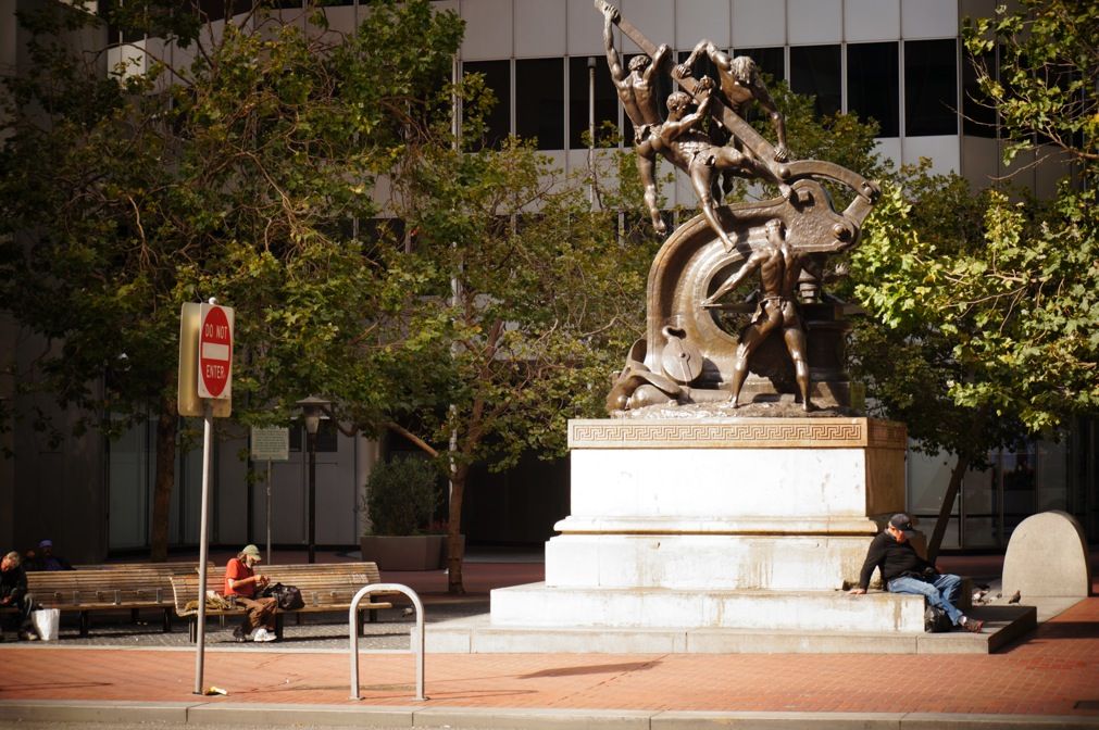 Resting on a monument.