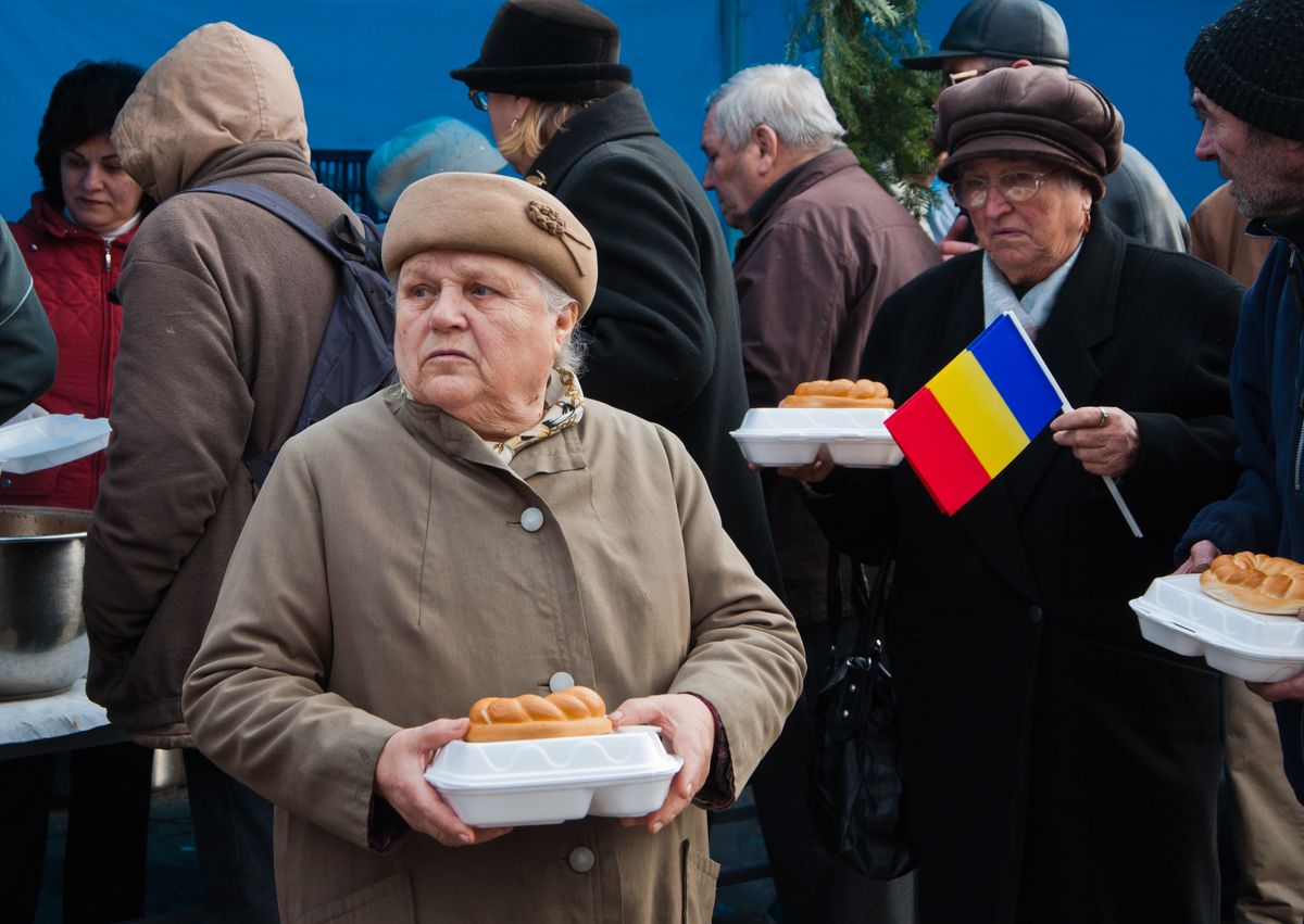 Romania, at the national day anniversary, authorities give a hot meal to poor people