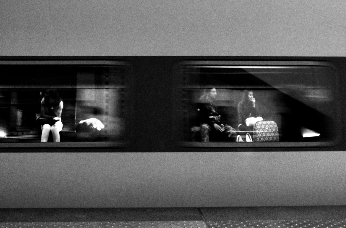 This was whilst we were waiting for a train in Antwerp. I was amazed by  the reflection of my mates in the train's windows, luckily I had the camera in my hands when the train arrived. 